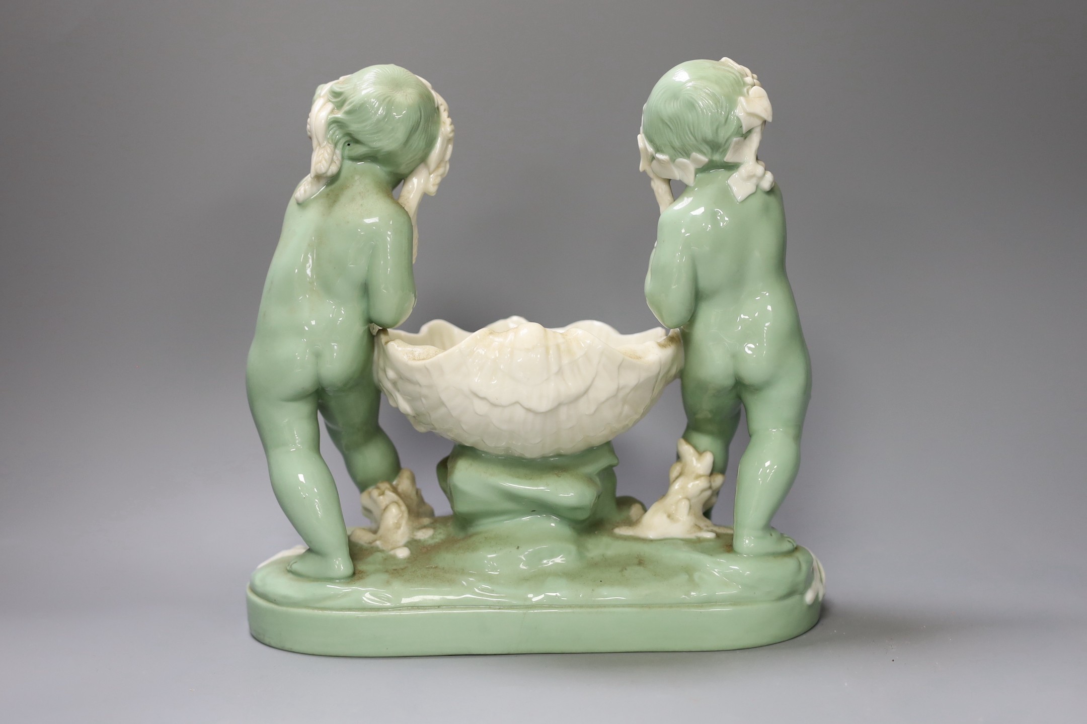 A Minton glazed celadon tinted parian centrepiece, mid 19th century, after Carrier-Belleuse, 26cms high